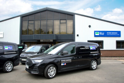 A photo of the R&J Machinery engineering team at our showroom, taken in October 2024.