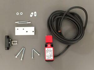 Photo of a reversion kit safety switch cover plate spare part