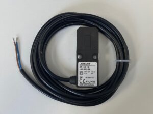 Photo of a Safety switch cover plate spare part