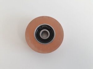 Photo of a Pressure roller (red) 75 Shore mounted spare part