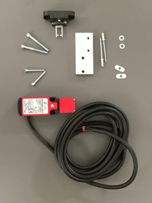 Photo of a reversion kit safety switch cover plate spare part