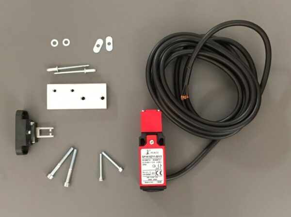 Photo of a reversion kit safety switch cover plate spare part