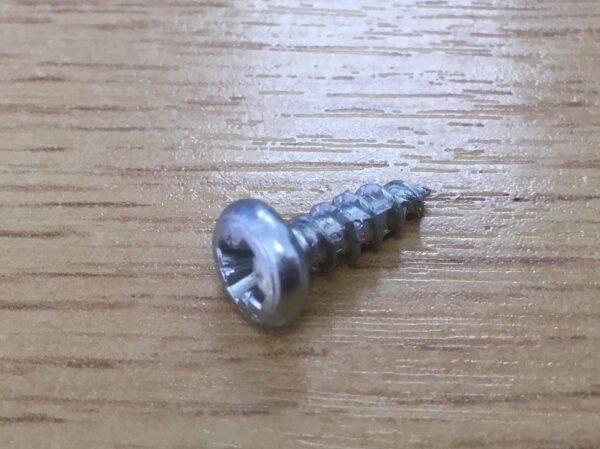 Photo of a Spax screw half round head 4x12 cross slot spare part